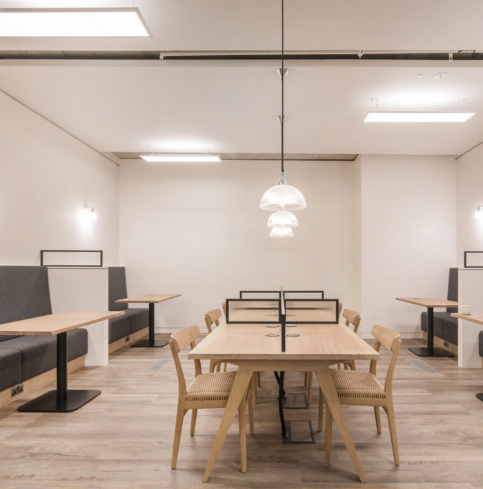 女裝公司辦公室辦公區(qū)裝修效果圖